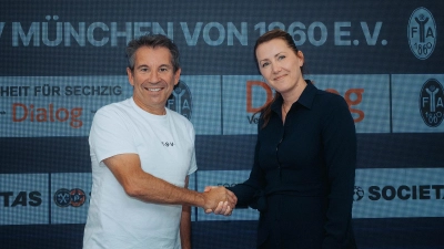 Gemeinsame Sache: Tamara Pagel, Vorstandsvorsitzende der Dialog Versicherungen, und Gernot Mang, Präsident TSV München von 1860 e.V. (Foto: TSV München von 1860 Spielbetriebs-GmbH)